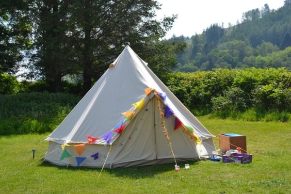 Lanefoot-Farm-Campsite-Bell-tent-with-flags-resized-1024x683